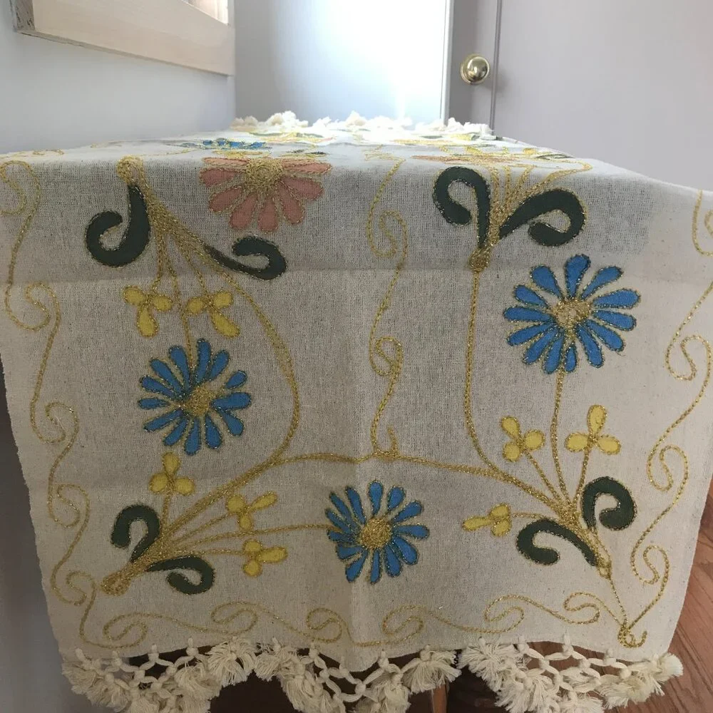 Decorative Turkish table runner with vibrant floral design.